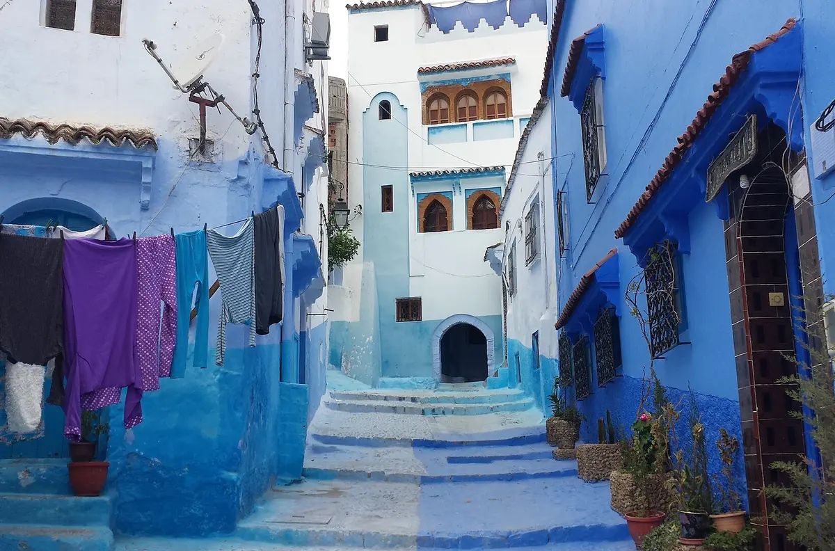 Blue-washed lanes climbing through the Chefchaouen medina